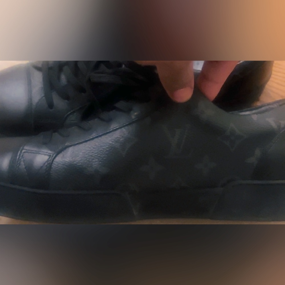 Men Louis Vuitton sneakers.. Worn approximately 5x… great shape